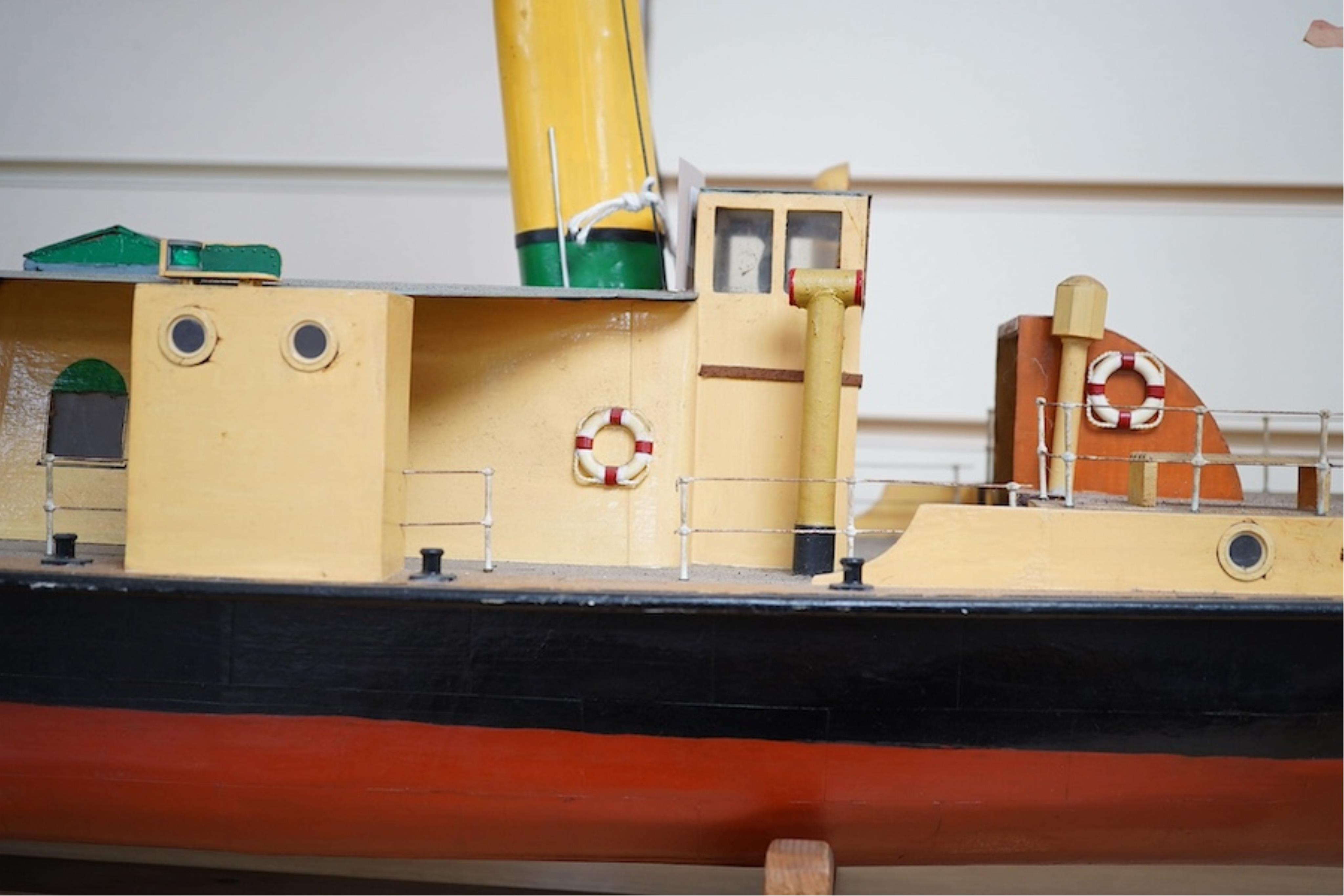 A scratch built model of an Isle of Man steam passenger ferry, 'Mona', of wood, card and plastic construction, powered by two electric motors, hull 108cm long. Condition - fair